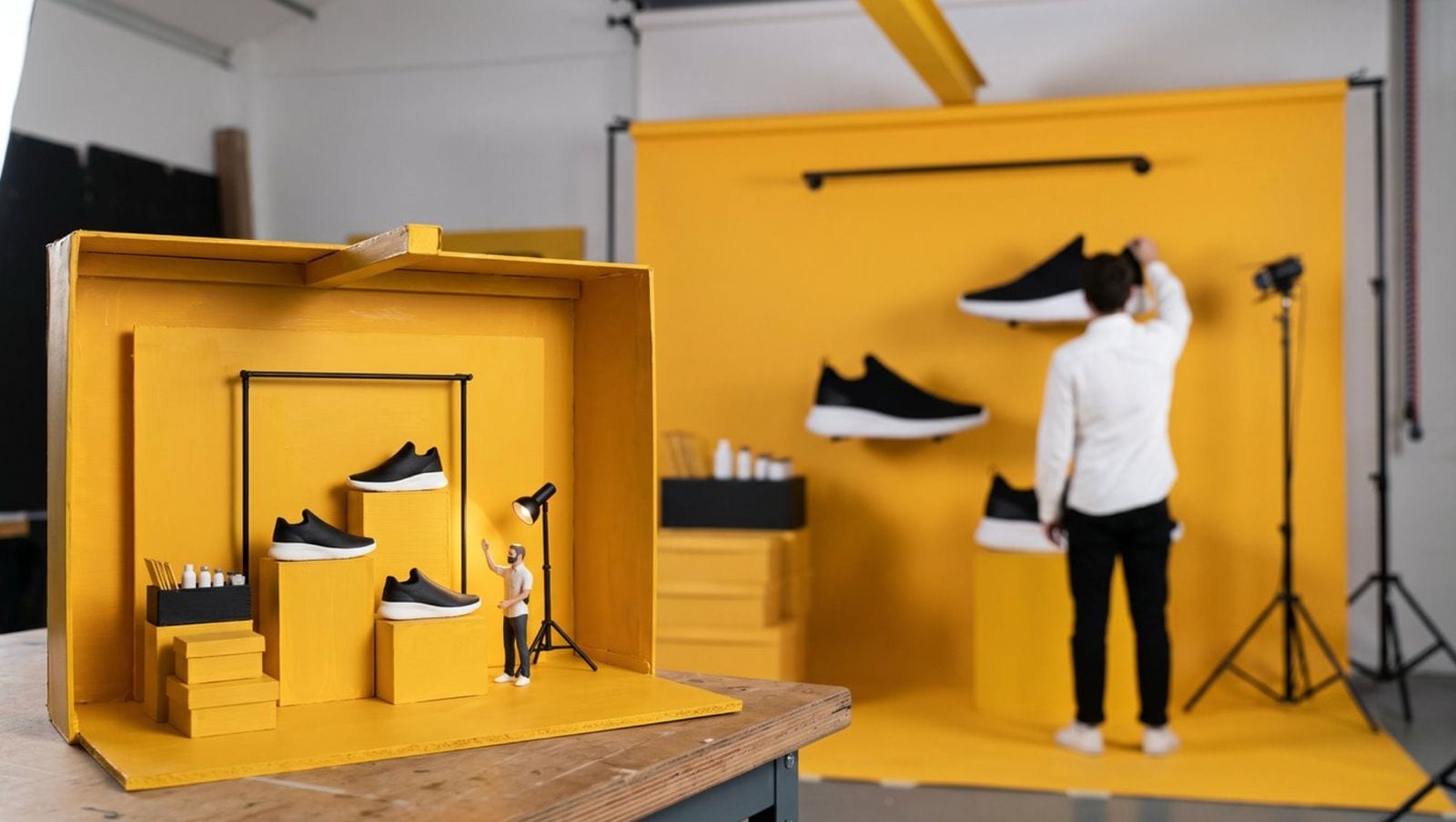 A yellow miniature set being photographed
